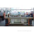 Automatic flat bed knitting machine for sweaters